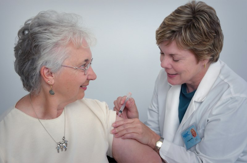 Doctor reviewing preventive health results with patient